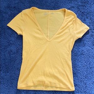 Yellow v neck shirt